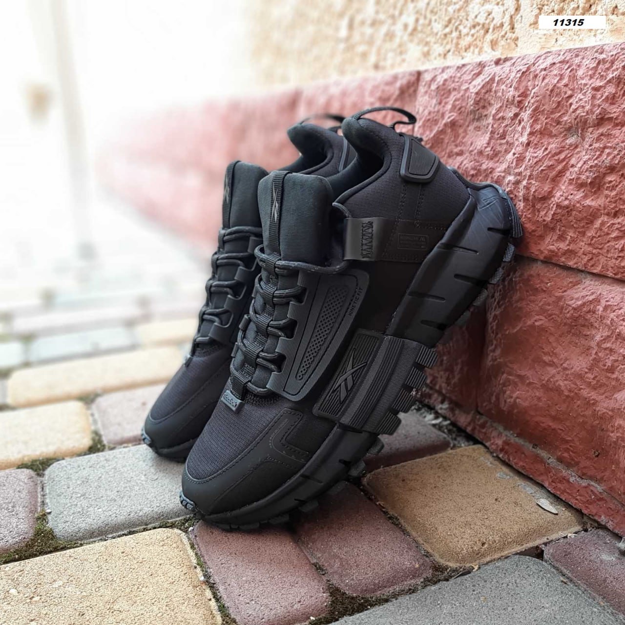 Кроссовки Reebok Zig Kinetica Edge текстильные черные демисезонные повседневные на шнуровке спортивная обувь